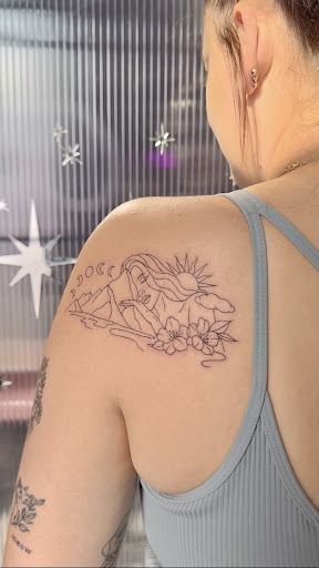 Explore floral arm sleeve tattoo ideas, creative tattoo ideas in Chicago, available at Crispy Aura Fine Line Tattoos