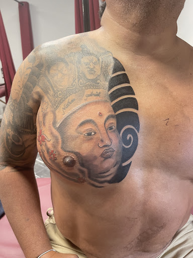 Explore lion sleeve tattoo ideas, creative tattoo ideas in Davenport, available at Eclipse Tattoos