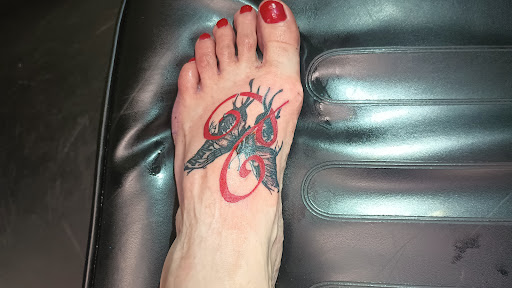 Explore opossum tattoo ideas, creative tattoo ideas in Redding, available at Dominant Ink