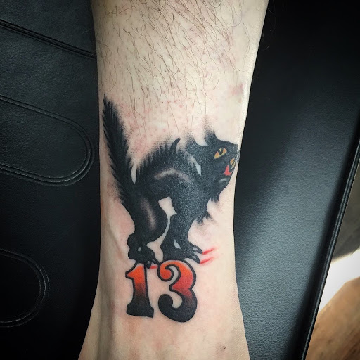 Explore tattoo name ideas on wrist, creative tattoo ideas in Norwalk, available at Saloon 13 LLC