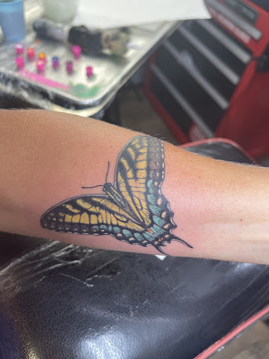 Explore musical tattoo ideas, creative tattoo ideas in Whiteville, available at Coup de Gras 2.0 Tattoo and Body Piercing