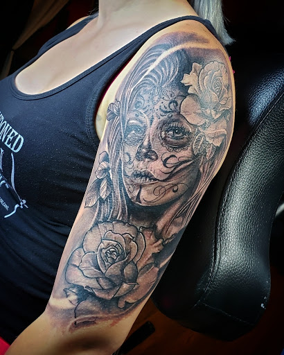 Explore four leaf clover tattoo ideas, creative tattoo ideas in Debary, available at Divine Line Tattoos