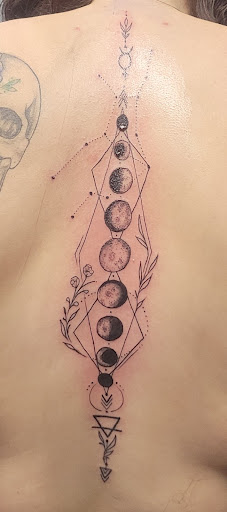 Explore above knee tattoo ideas, creative tattoo ideas in Schaumburg, available at Atmosphere Tattoo Gallery - Schaumburg