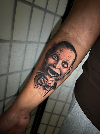 Explore leg tribal tattoo ideas, creative tattoo ideas in Modesto, available at Dying Art Tattoo