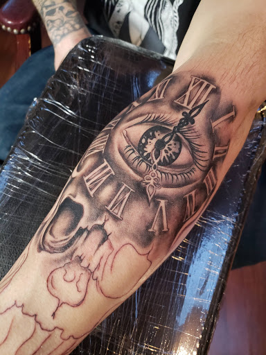 Explore daughter tattoo ideas for dad, creative tattoo ideas in Sparks, available at Shades of Gray Tattoo Studios