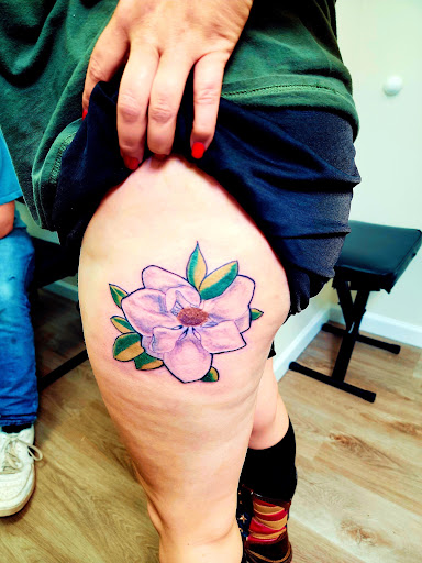 Explore wrist wrap tattoo ideas, creative tattoo ideas in Conway, available at Primal Urge Tattoos