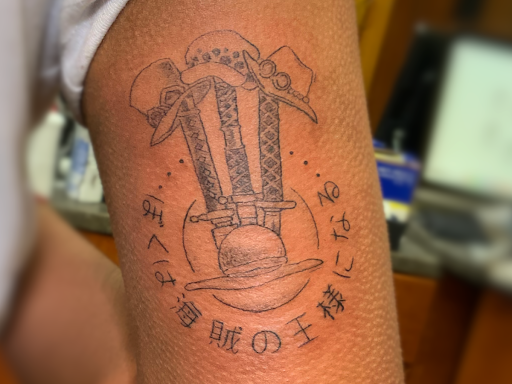 Explore mens tricep tattoo ideas, creative tattoo ideas in Fairfax, available at Factor Studio Tattoo