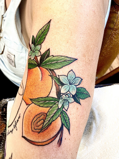 Explore illuminati tattoo ideas, creative tattoo ideas in Lees Summit, available at Bleeding Heart Tattoo