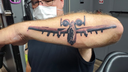 Find tattoo ideas for a mom for your next unique tattoo in Largo at Alchemy Tattoos and Body Piercings