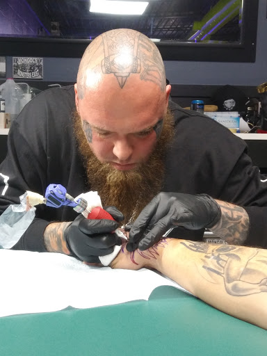 Explore tattoo ideas for men shoulder, creative tattoo ideas in Virginia Beach, available at World Famous Blue Horseshoe Tattoo and Piercing Independence