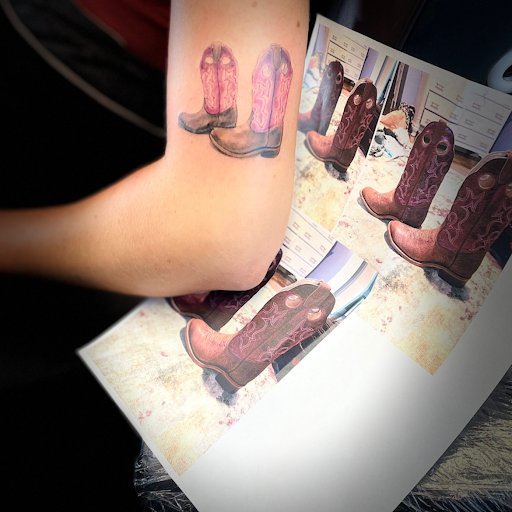 Explore ripped tattoo ideas, creative tattoo ideas in Belmont, available at The Body Art Gallery