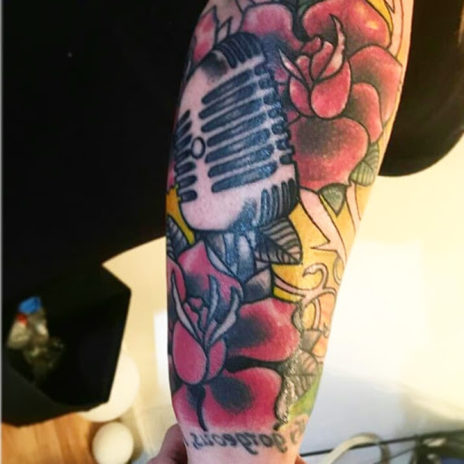 Explore tattoo ideas for dark skin guys, creative tattoo ideas in Atlantic Beach, available at The Ink Chamber Tattoo Parlor