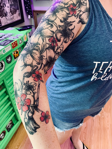 Explore golf tattoo ideas, creative tattoo ideas in Gautier, available at Voodoo Tattoo
