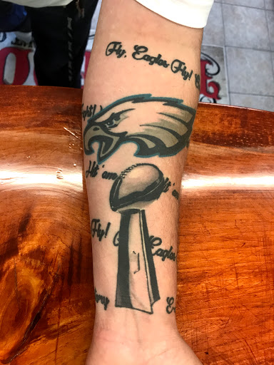 Tattoo Shop «BioGraphix Tattoo Studio», reviews and photos, 147 W Manlius St, East Syracuse, NY 13057, USA