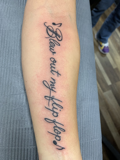 Explore paw print tattoo ideas, creative tattoo ideas in Fargo, available at Golden Dragon Tattoo