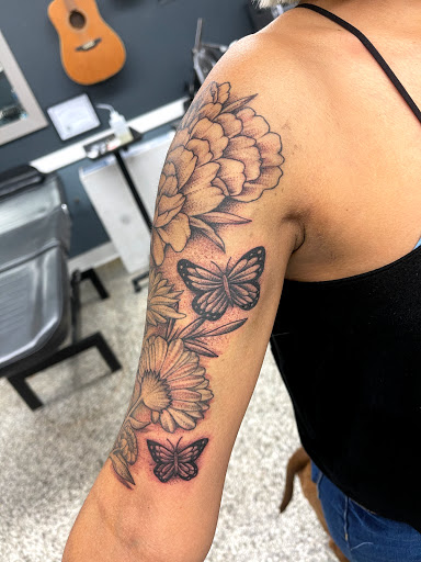 Find tummy tuck tattoo ideas for your next unique tattoo in Sanford at Luv Ink