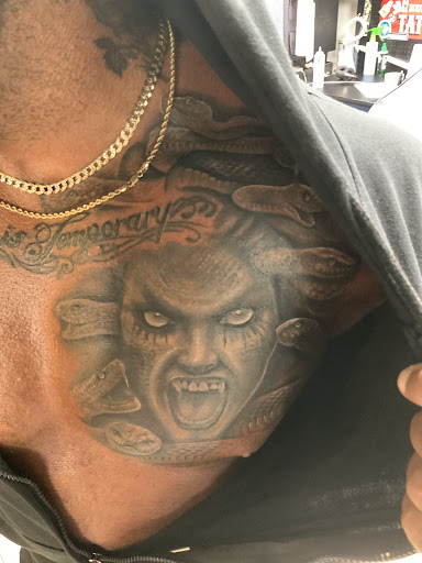 Explore st michael the archangel tattoos ideas, creative tattoo ideas in Sarasota, available at SEVEN SINS Tattoo Studio