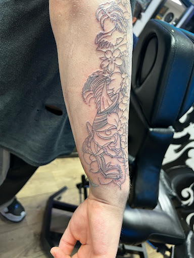 Explore astronomical tattoo ideas, creative tattoo ideas in Jefferson, available at Slammin Ink Tattoo