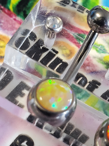 Explore london tattoo ideas, creative tattoo ideas in Aurora, available at Skin of A Different Color