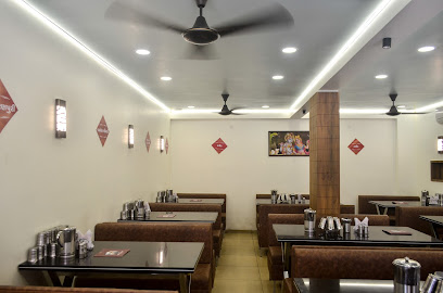 Madhav Restaurant-Gujarati Thali Restaurant/Family - Corporation Chok, P.R.Complex, Dhebar Rd, near ST bus stop, Rajputpara, Rajkot, Gujarat 360001, India