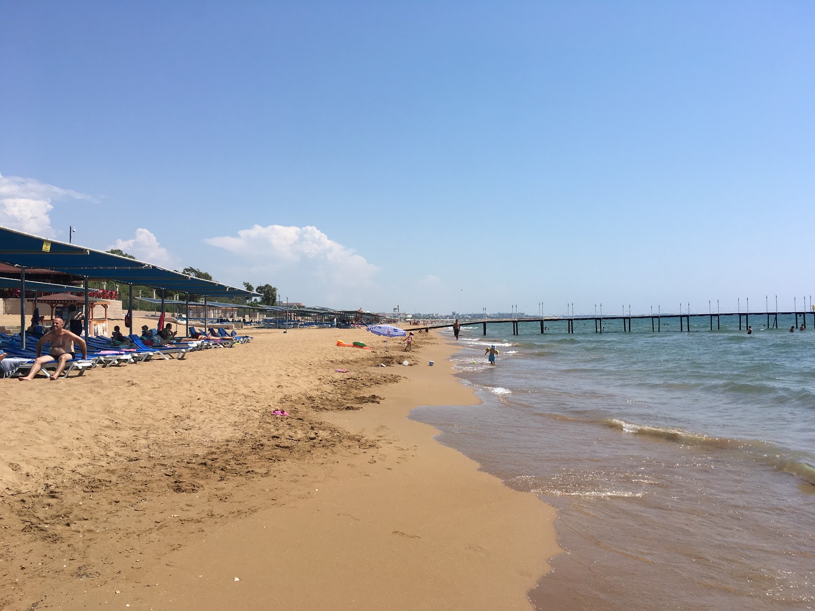 Fotografija Side beach II z fino rjavi pesek površino