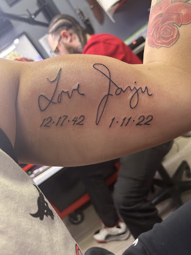 Explore feather memorial tattoo ideas, creative tattoo ideas in Providence, available at F.I.N.A.O. Ink Tattoo Company