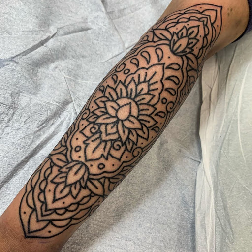 Explore half leg sleeve tattoo ideas for men, creative tattoo ideas in Vista, available at American Tattoo Vista