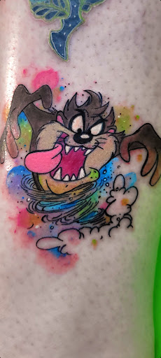 Explore giving tree tattoo ideas, creative tattoo ideas in Benton, available at Spectrum Tattoo