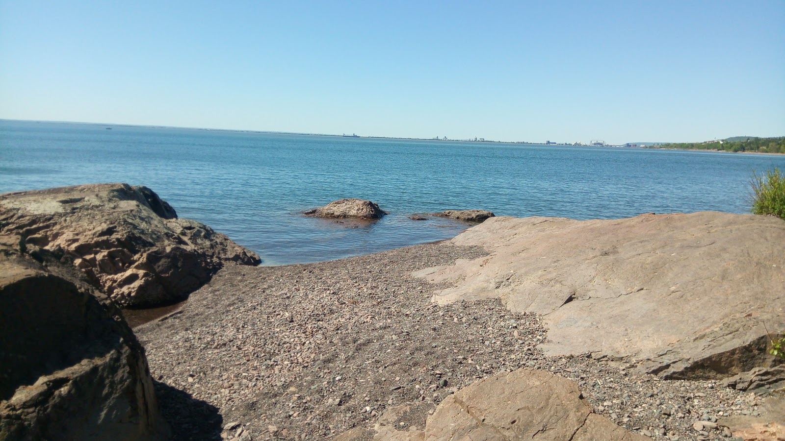 42nd Avenue Beach'in fotoğrafı geniş bir kıyı şeridi ile birlikte