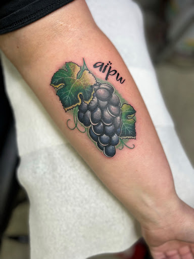 Explore women arm tattoo ideas, creative tattoo ideas in Smithville, available at Sanctioned Arts Tattoo Co.