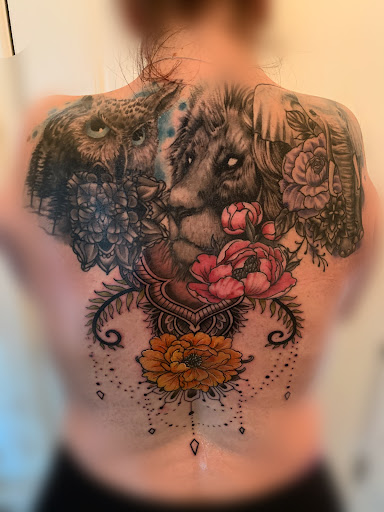 Explore domestic violence tattoo ideas, creative tattoo ideas in Titusville, available at Exclusive Ink Studio