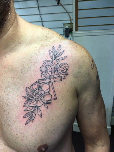 Explore tattoo cover up ideas on leg, creative tattoo ideas in Eureka Springs, available at Sailors Luck Tattoo