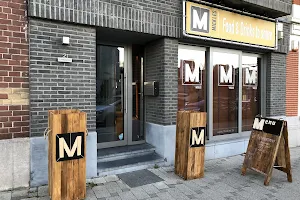 M by Mickles image