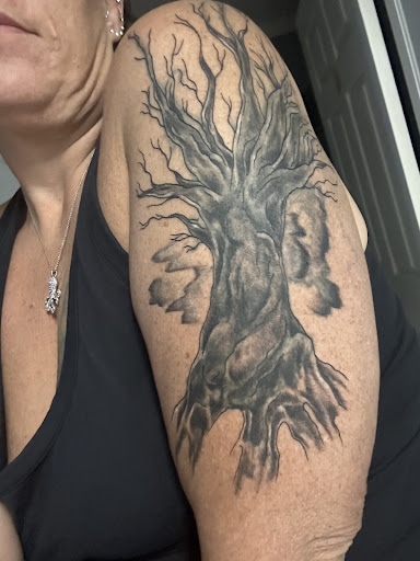 Explore womb tattoo ideas, creative tattoo ideas in Fort Myers, available at HOWL Tattoo & Piercing