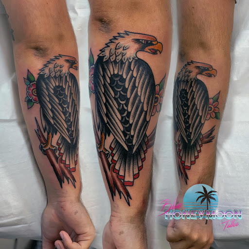 Explore purple flower tattoo ideas, creative tattoo ideas in Islip, available at Blue Honeymoon Tattoo
