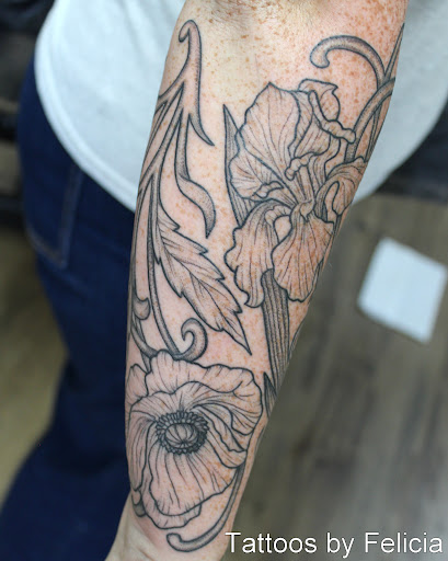 Explore alligator tattoo ideas, creative tattoo ideas in Fort Myers, available at Tiger Lotus Tattoo and Piercing