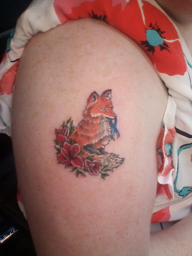 Explore purple rose tattoo ideas, creative tattoo ideas in Redding, available at DEADLIFT TATTOO