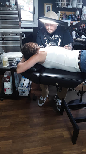 Explore cool christian tattoo ideas, creative tattoo ideas in Batavia, available at High Voltage Tattoo & Piercing