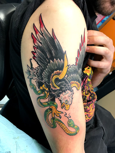 Explore chest piece tattoo ideas woman, creative tattoo ideas in Aurora, available at Ronin Tattoo Studio INC