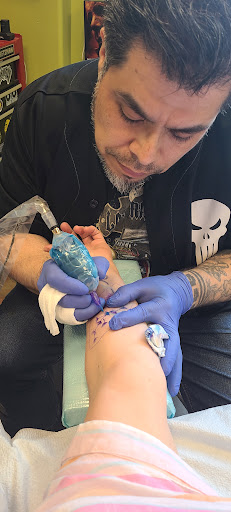 Explore hen tattoo ideas, creative tattoo ideas in Lockport, available at Tattoo City by Larry Brogan