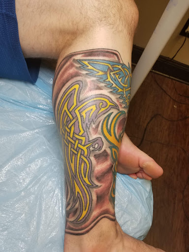 Explore traditional elbow tattoo ideas, creative tattoo ideas in Severna Park, available at Oxblood Ink