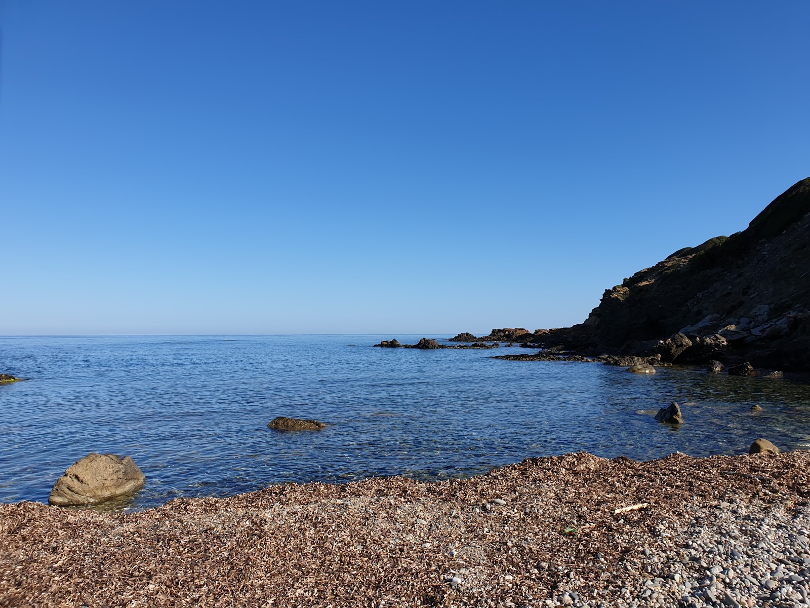 Fotografija Punta Campu Sali z majhni več zalivi