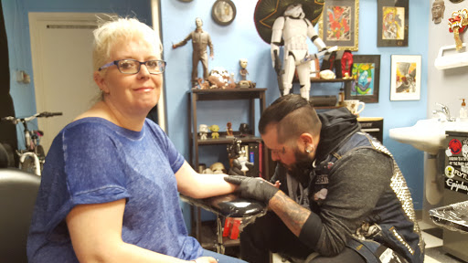 Tattoo Shop «InkSylum Tattoo», reviews and photos, 1726 S Chambers Rd, Aurora, CO 80017, USA
