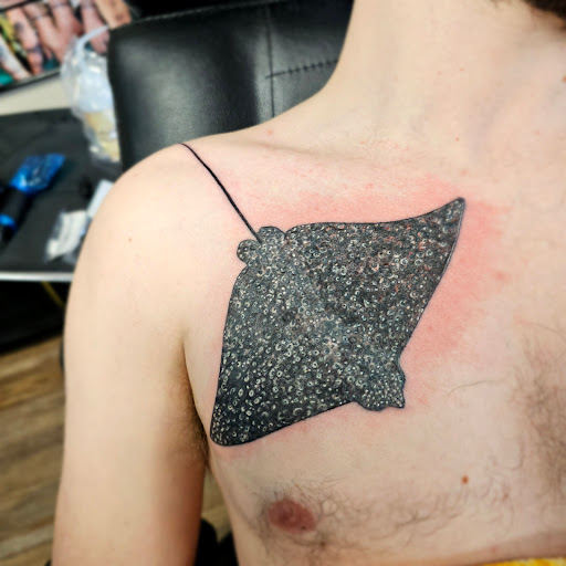 Explore tattoo ideas graffiti, creative tattoo ideas in Traverse City, available at Pinups & Needles