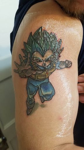 Explore bite mark tattoo ideas, creative tattoo ideas in Tooele, available at Tattoos on Vine