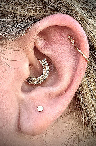 Explore celestial tattoo ideas, creative tattoo ideas in Chapel Hill, available at Spica Body Piercing