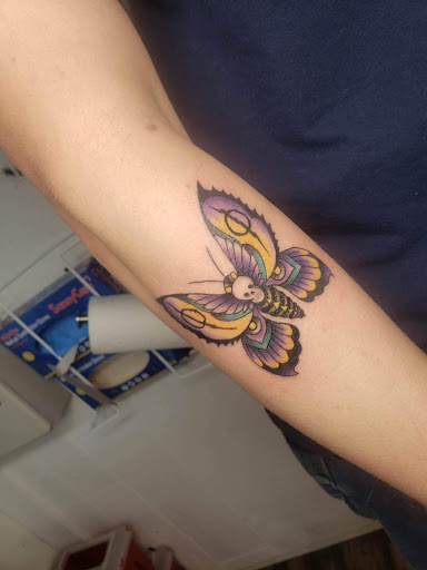 Explore inner arm cover up tattoo ideas, creative tattoo ideas in Decatur, available at Exclusive Ink Tattoos & Body Piercings 22nd & Wood