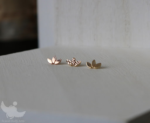 Explore blackout hand tattoo ideas, creative tattoo ideas in Syracuse, available at Scarab Body Arts