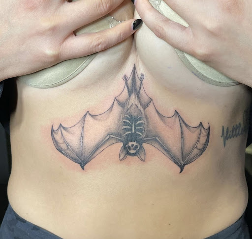 Explore rock tattoo ideas, creative tattoo ideas in Peoria, available at Modern Ink Tattoo