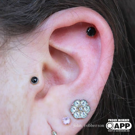 Explore catholic tattoo ideas small, creative tattoo ideas in Fort Myers, available at Tiger Lotus Tattoo and Piercing